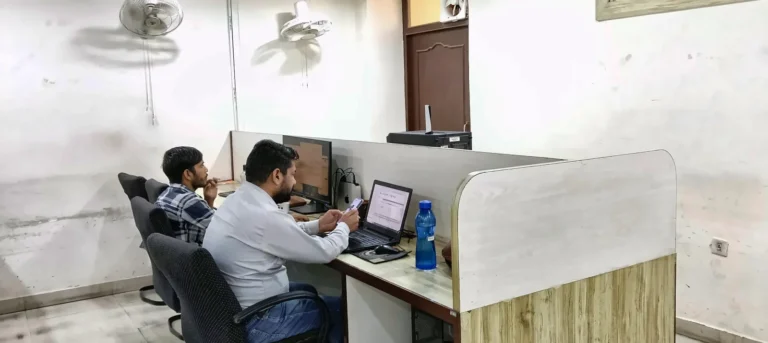 Learners working on live project tasks at Infonic Training workstations in Jaipur